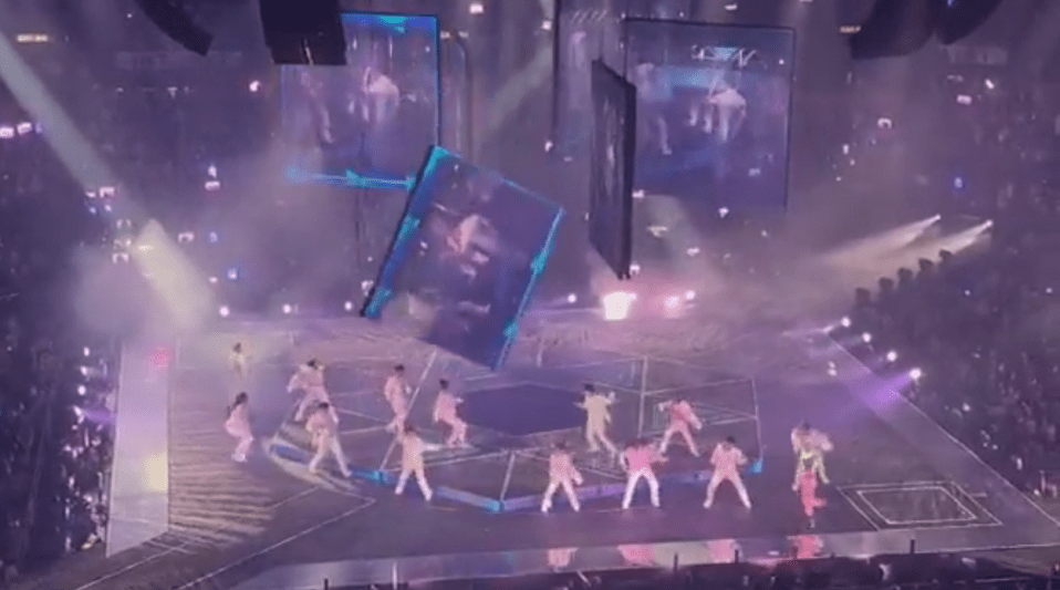 The screen fell with one of the dancers standing directly under it