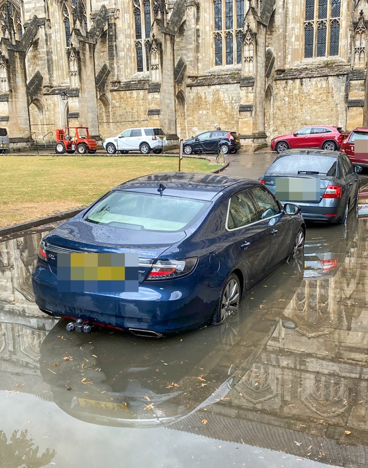 Parked cars were stuck in floodwater in Winchester