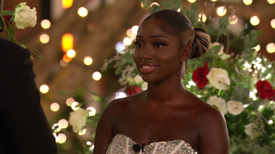 Indiyah beams as she listens to Dami's romantic speech