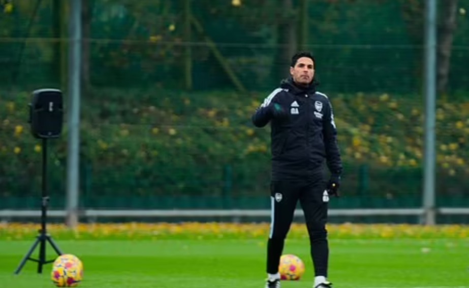 Arteta watched his players train while music blared in the background