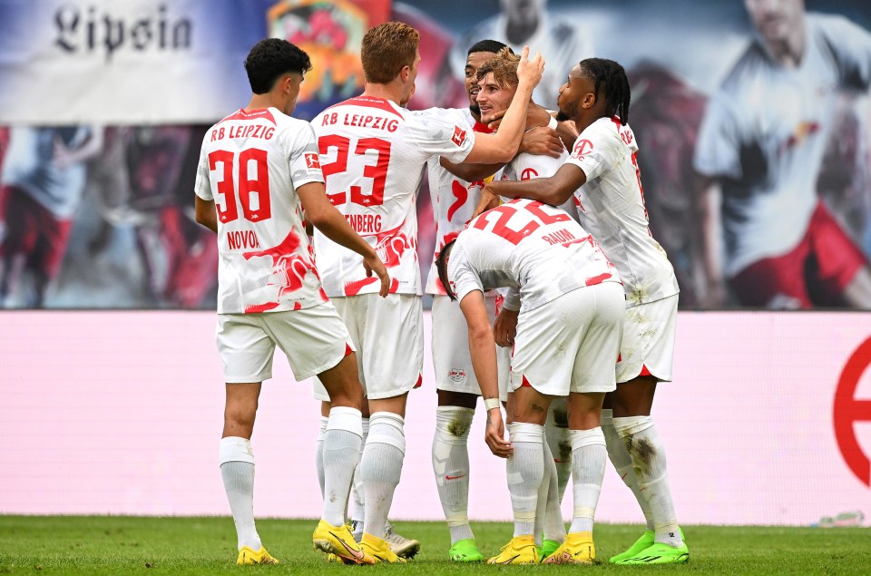 RB Leipzig mob returning hero Timo Werner after his 36th minute opener at home to Cologne in the Bundesliga on Saturday