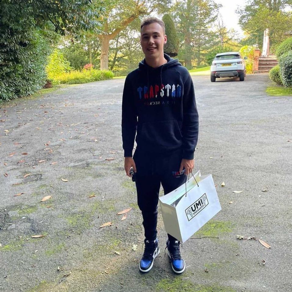 Chelsea youngster Harvey Vale flashes his purchase in a customised Umi Sneakers bag