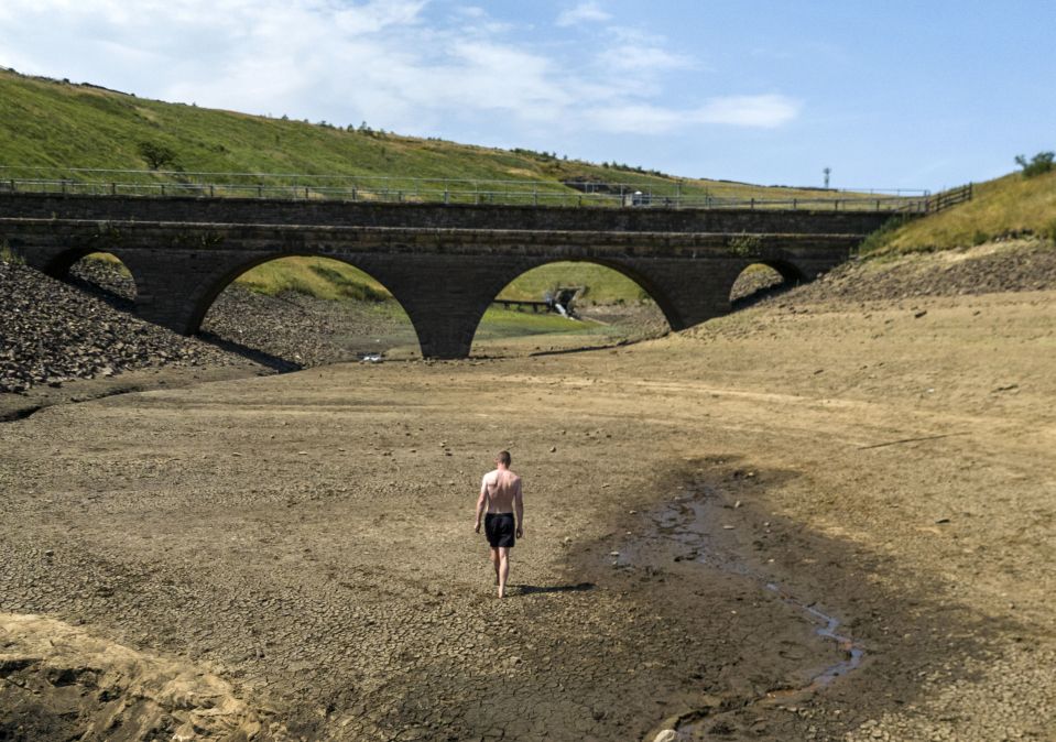 The Dowry Resorvoir near Oldham, Lancs, is one of many to dry up as Britain bakes