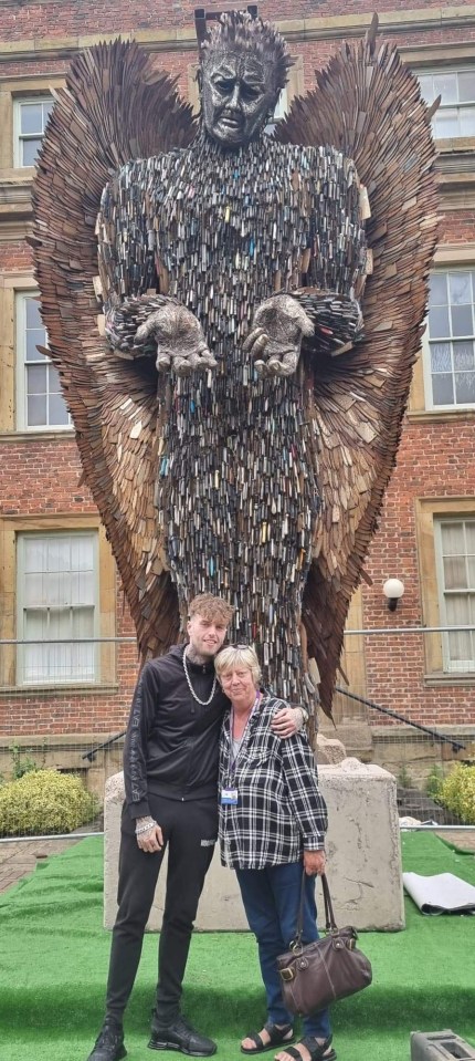 Theresa with the ‘Knife Angel’, a sculpture made of 100,000 discarded and confiscated knives which was installed in Redcar this week