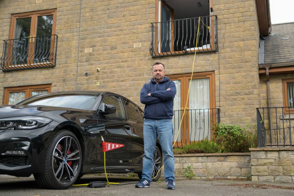 Joe Keating is disappointed he has to charge his car from his upstairs window