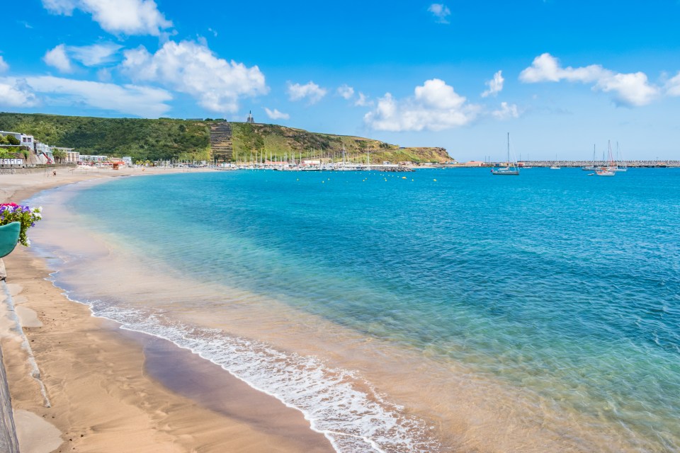 The beach at Porto Martins is a spectacular setting