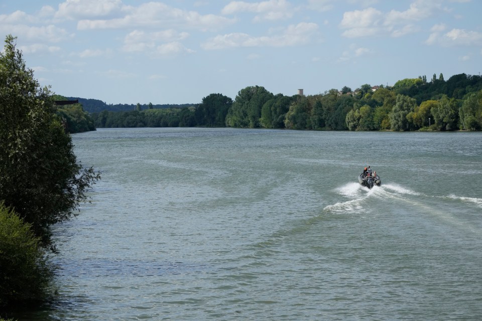 Firefighters are tracking the whale on a rubber boat