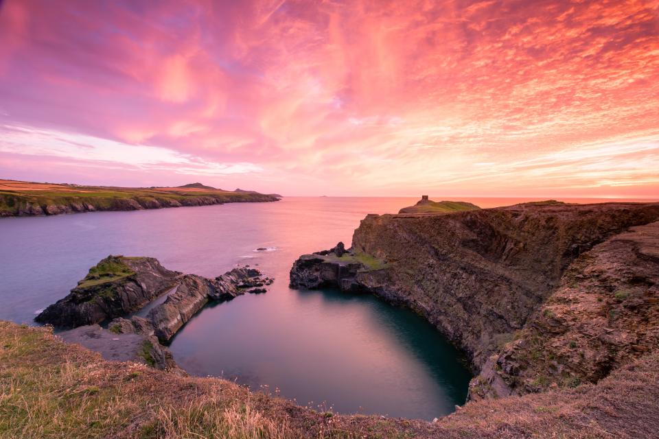 The blue lagoon in Wales is a former slate quarry and is popular with cliff divers