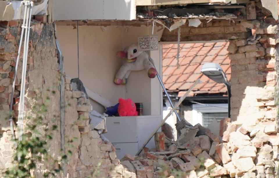 A horrifying image shows a child's bedroom gutted by the blast - a toy can be seen on the wall