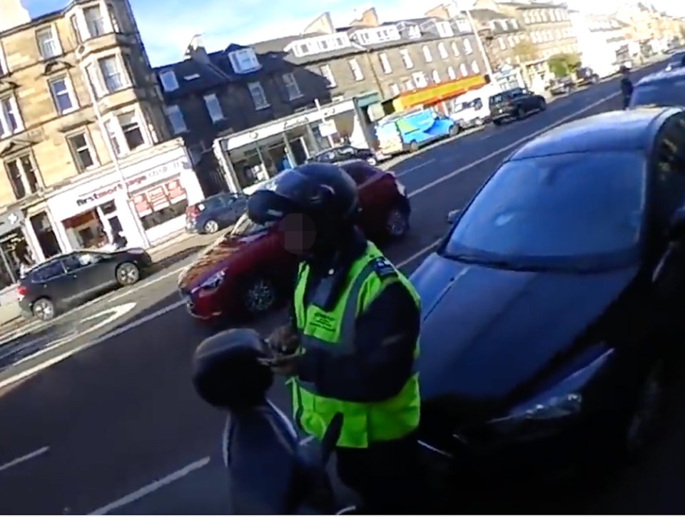 So the cyclist heads back and reports him to a parking warden himself