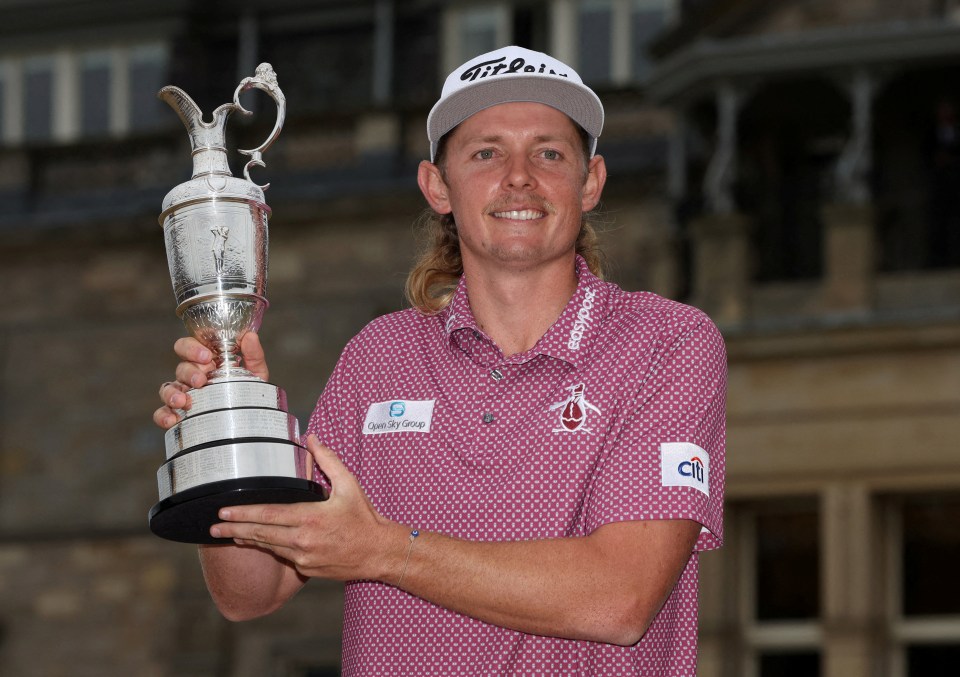 Australia’s Cameron Smith poses with the Claret Jug