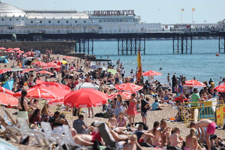 Brits enjoy the hot weather in Brighton, as another heatwave hits the UK