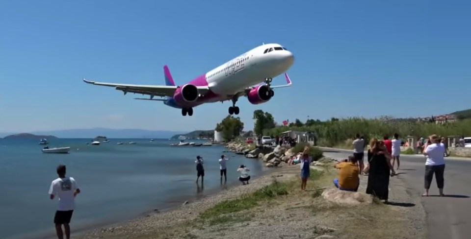 The plane spotters gathered near the runway got more than they bargained for