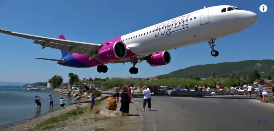 The Wizz Air plane comes in incredibly low to land