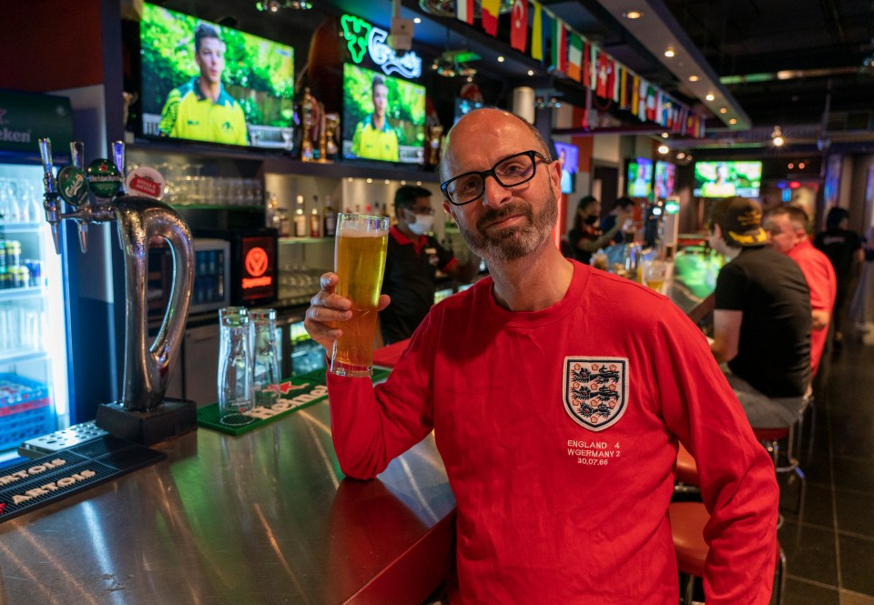 Boozing in public is banned, here Oliver is drinking £13 pint of beer at Champions bar