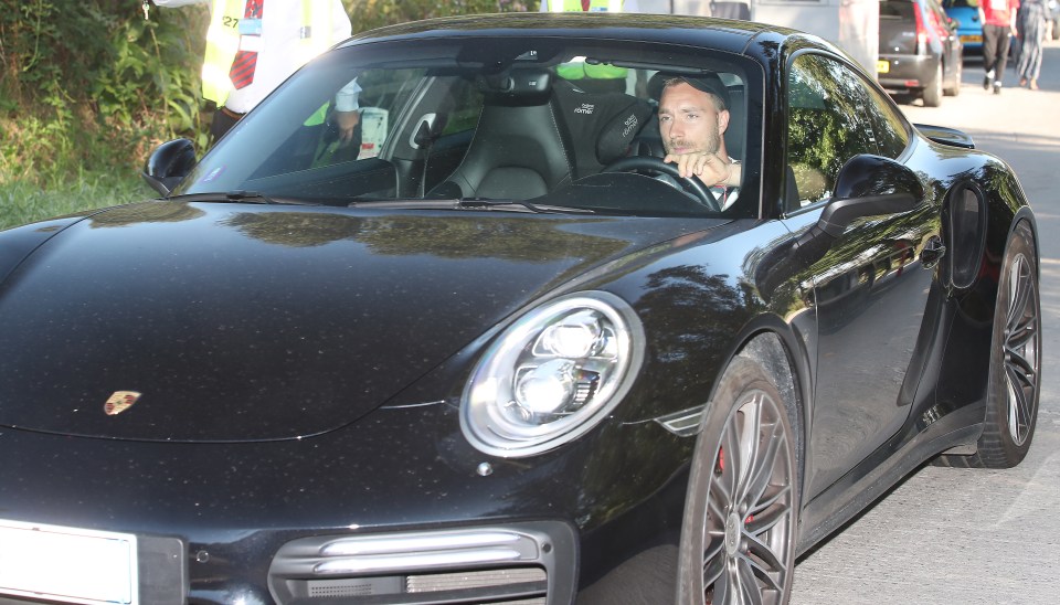 Christian Eriksen drives his Porsche to work