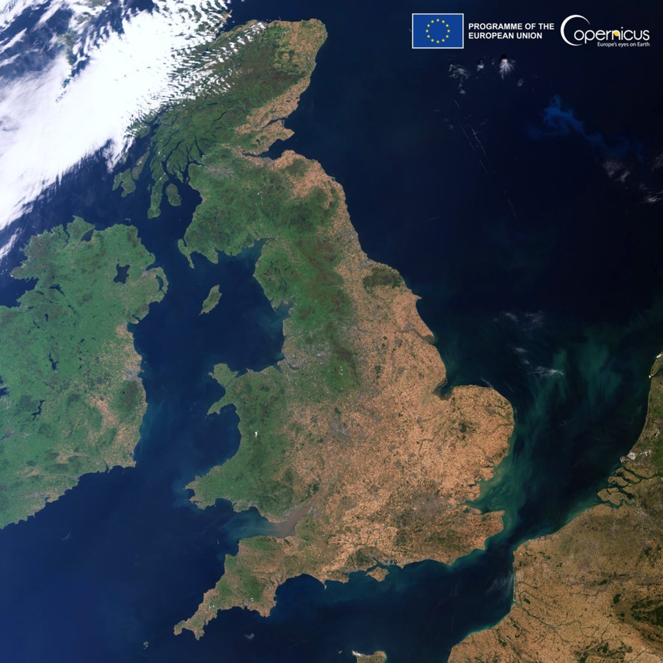 This satellite image shows more than half of Britain has been baked brown during the summer of heatwaves