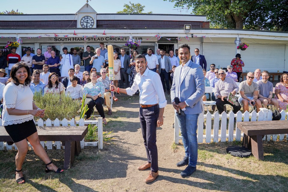 Rishi Sunak raising his bat rather than tax