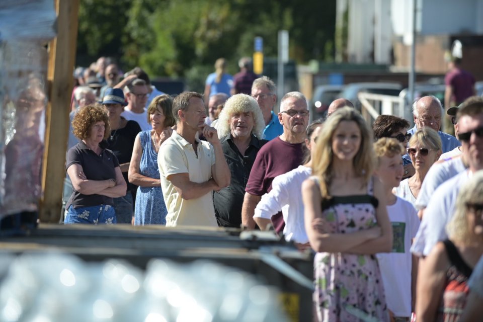 Queues could be seen snaking around a local car park as workers dished out bottles