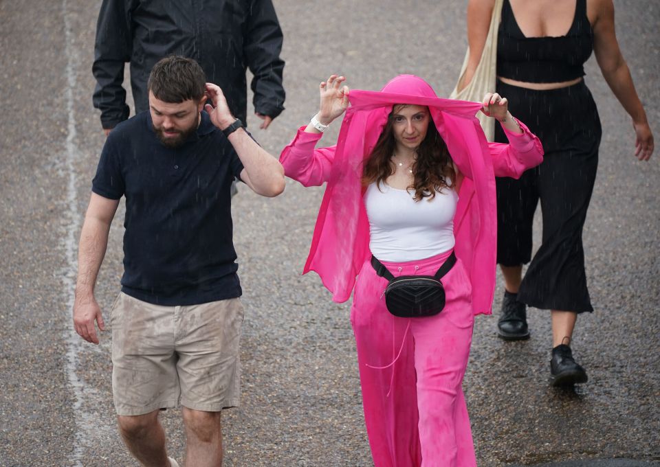 Brits rushed to shelter from the rain in the capital