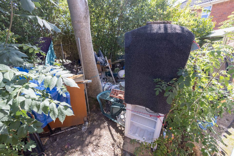 An old fridge freezer and other gadgets have been dumped