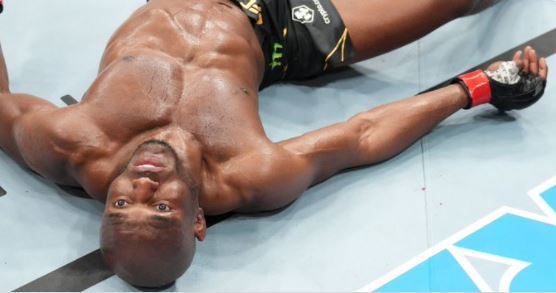 Kamaru Usman lies flat on his back after being KO'd by Leon Edwards