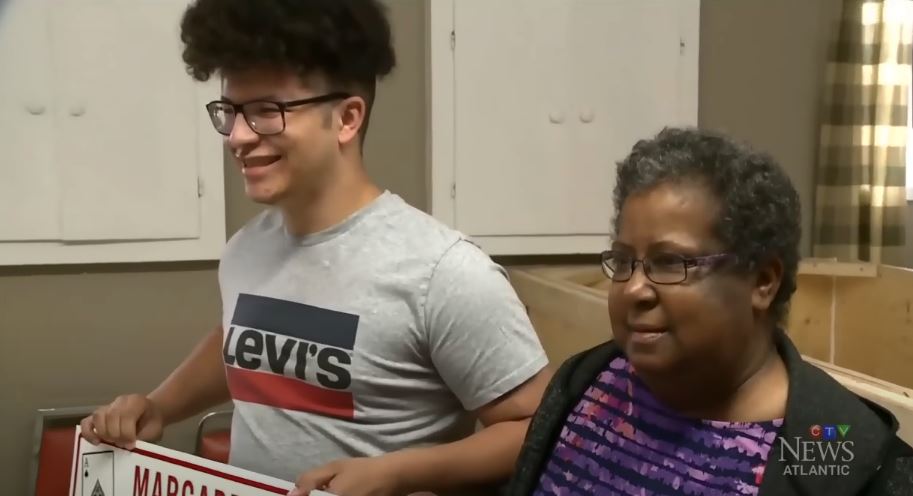 Tyrone MacInnes celebrates lotto win with his aunt Barbara Reddick