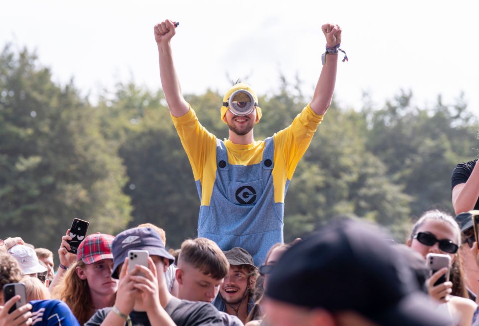 A music lover dressed as a Minion from the Universal Pictures franchise