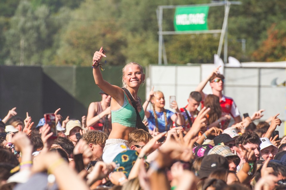 Music fans watching AJ Tracey on stage in Reading