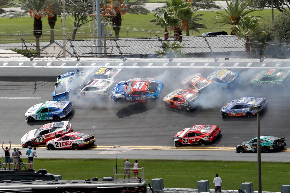 Drivers blamed the rain-affected track for the huge collision