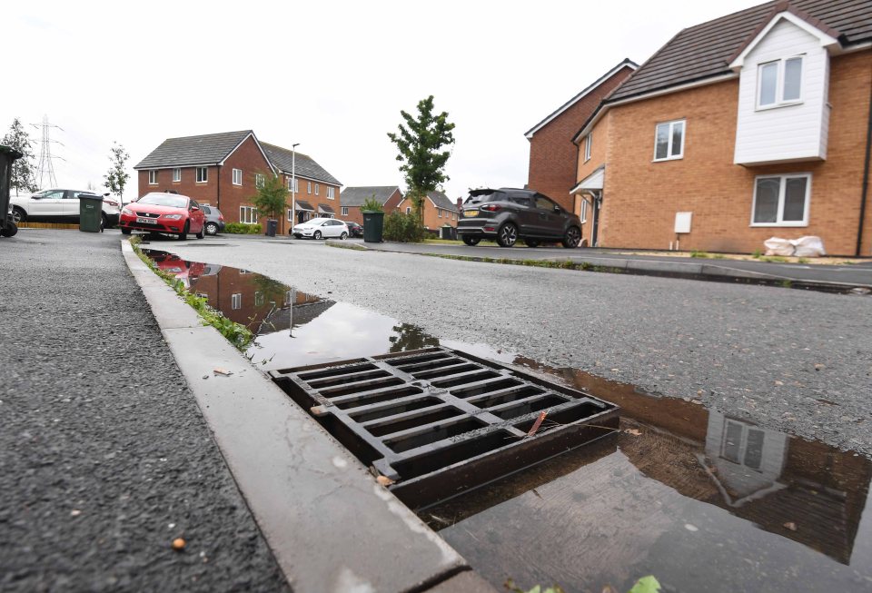 The unfinished estate has left the main road covered in pot holes and raised ironworks