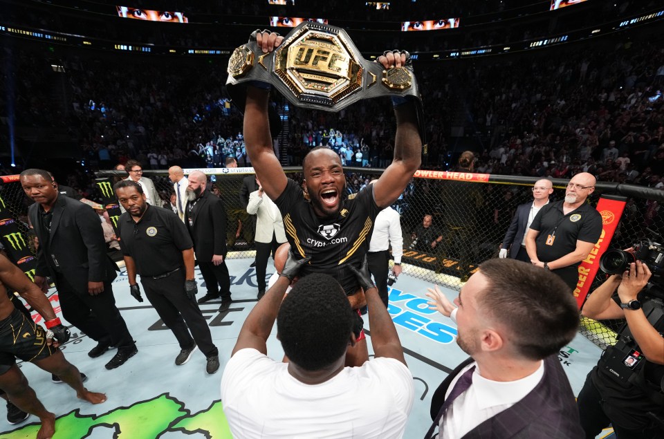 Rocky holds the UFC welterweight title aloft