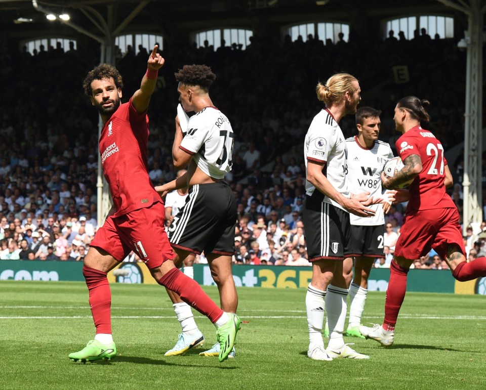 Mo Salah celebrates after scoring against Fulham