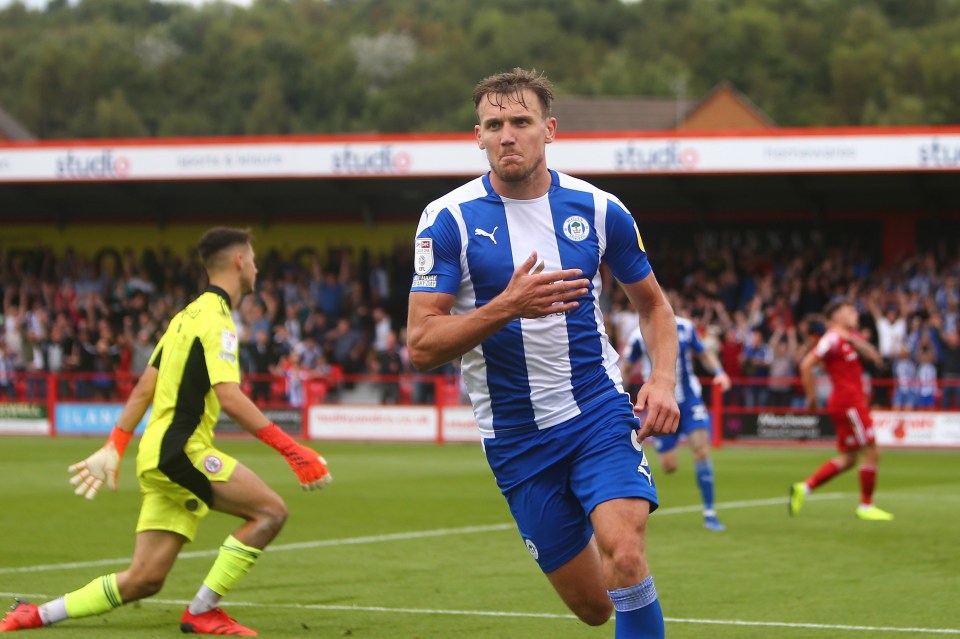 Charlie Wyke celebrates scoring for Wigan in 2021