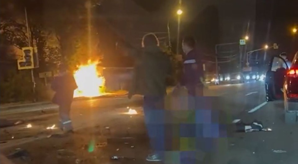 Terrified bystanders watched on in horror as the car was engulfed by flames