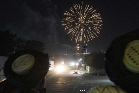 Taliban militants set off fireworks to mark one year since US troops withdrew