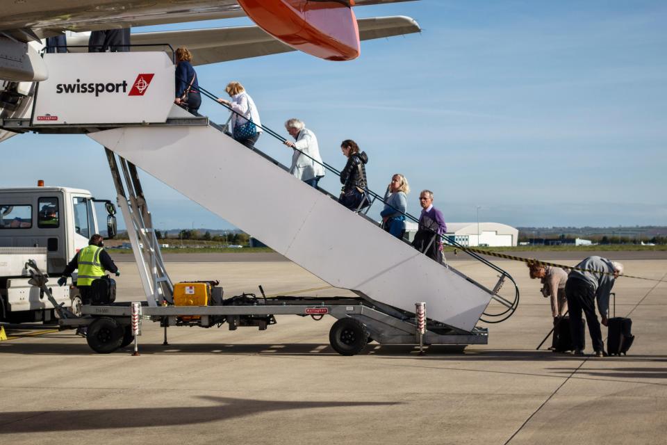 Passengers have been advised to wait until it's their turn to board the plane