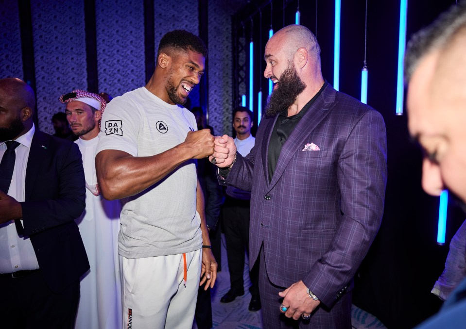 Joshua with former WWE star Strowman