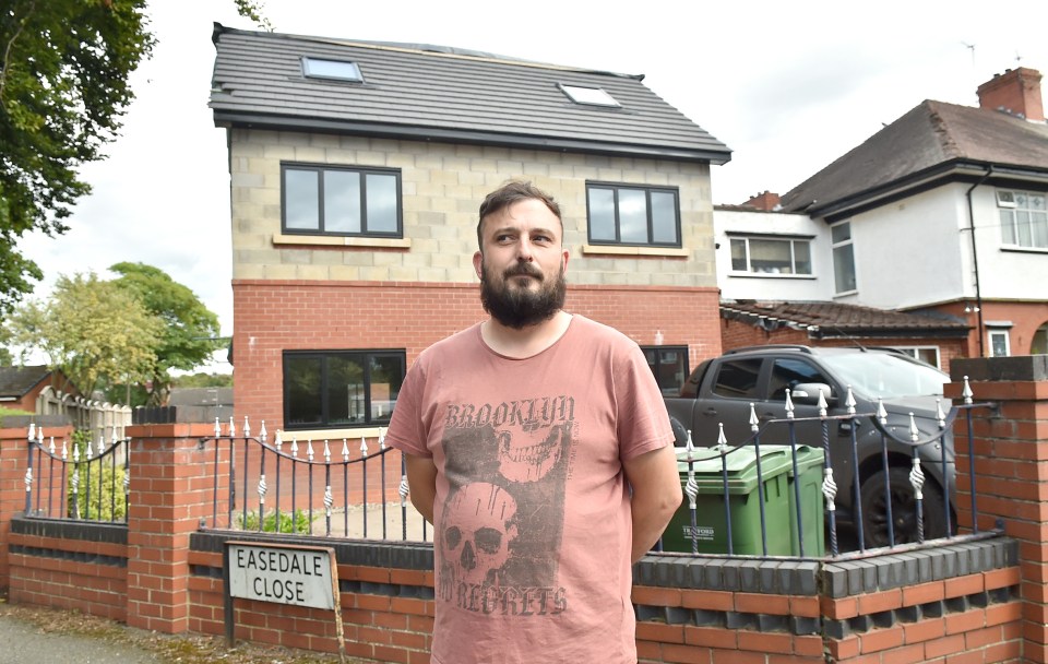 A homeowner has been ordered to demolish his brand new home in Greater Manchester. Pictured is Gavin Hartley, who called the decision a 'fiasco'