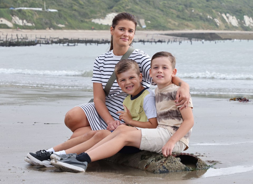 Mum-of-two Emma Horne, 30, was at the beach with her children Finley, seven, and Alby, five