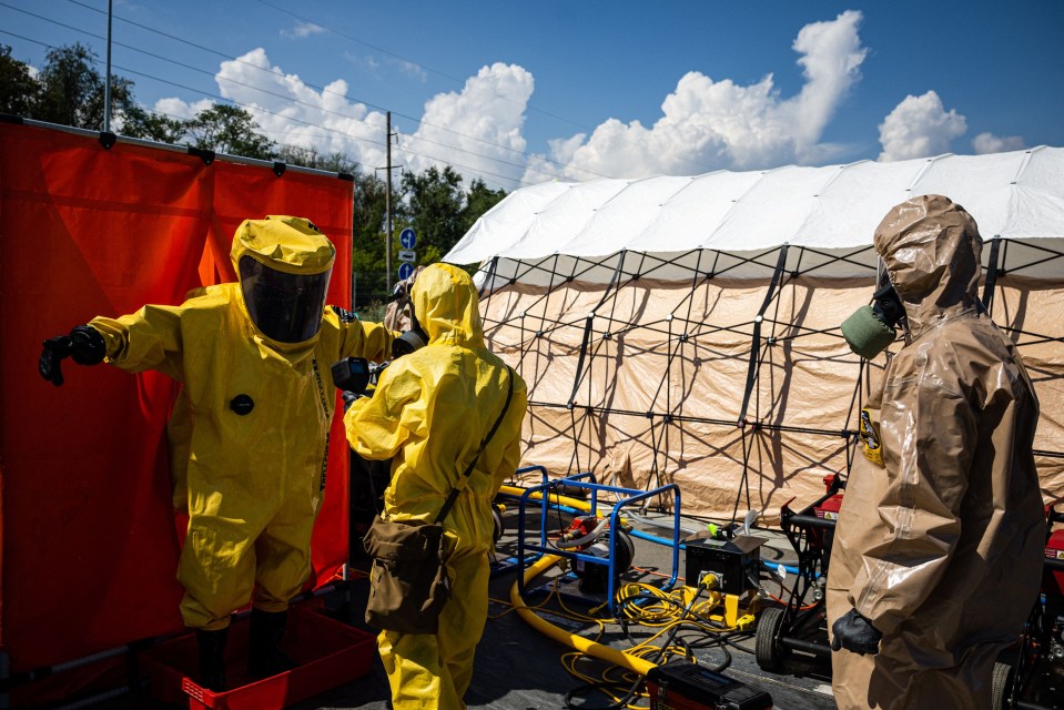 Ukrainian Emergency Ministry rescuers attend an exercise in the city of Zaporizhzhia