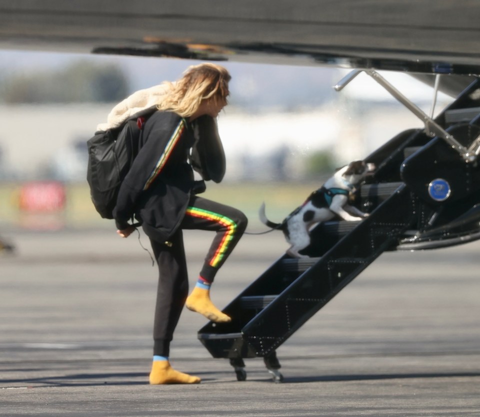 Cara had boarded the plane without shoes on