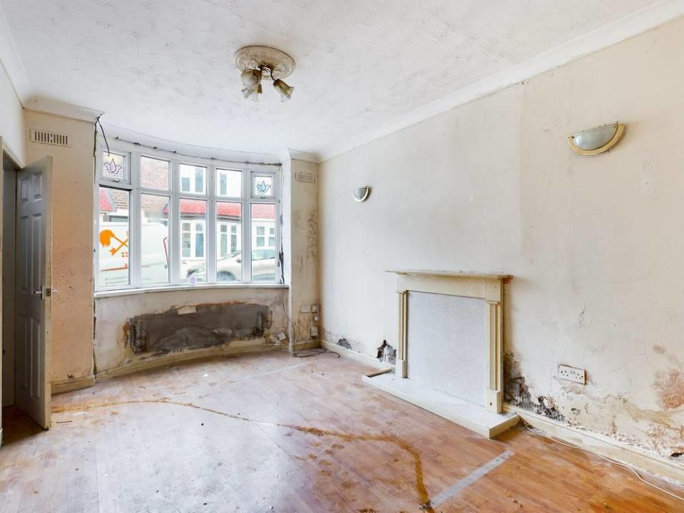 The lounge has exposed brick and a weird slug-like trail across the floor