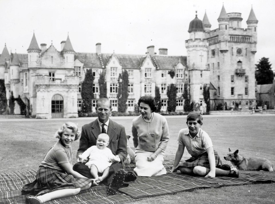 Family time picnicking with Prince Philip, Anne, Andrew and Charles at Balmoral in 1960