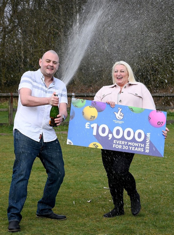 Happier times: Kirk and Laura celebrated what Kirk thought was a shared lotto triumph