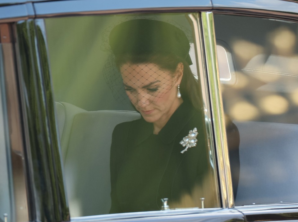 Kate wore a black veil as she joined the procession