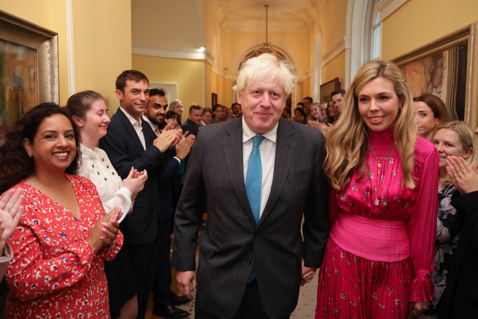 Boris and Carrie were greeted by cheers and applause from inside No10 as they made their way to leave the building ahead of the speech