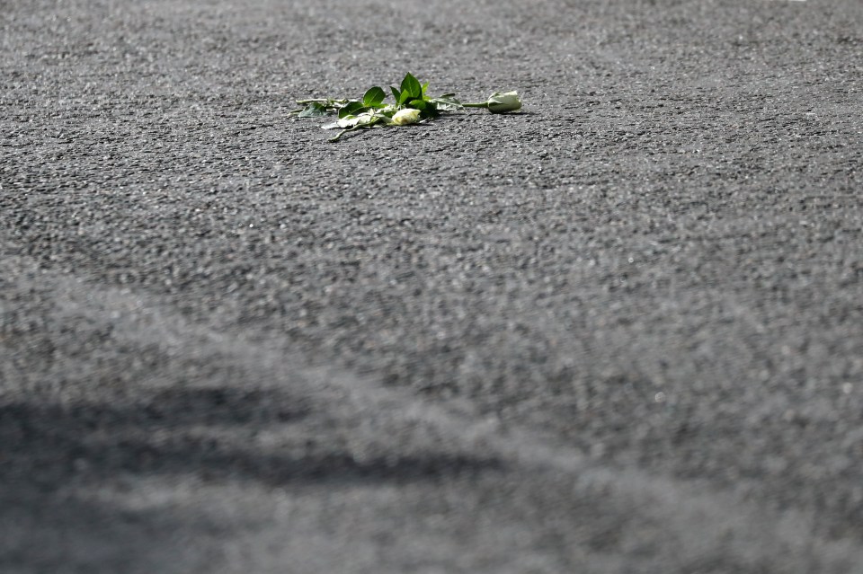 Flowers could be seen on the ground in tribute to Her Majesty