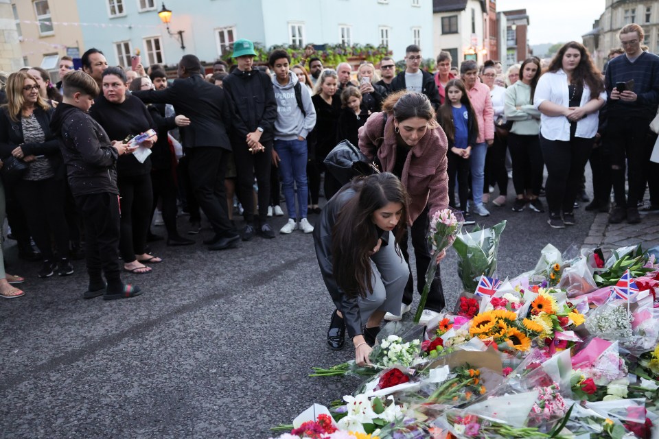 Flowers being left outside Windsor Castle earlier in the day