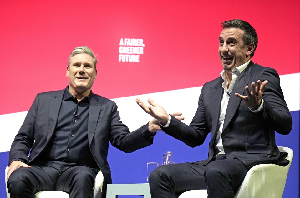 Labour leader Sir Keir Starmer speaks with Former Man United star Gary Neville on day two of the Labour Party Conference